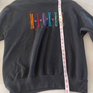 Vintage embroidered spell out Mickey. Measures size medium, Rainbow